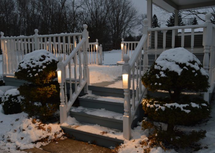 Snow covered Illuminated patio and deck lighting
