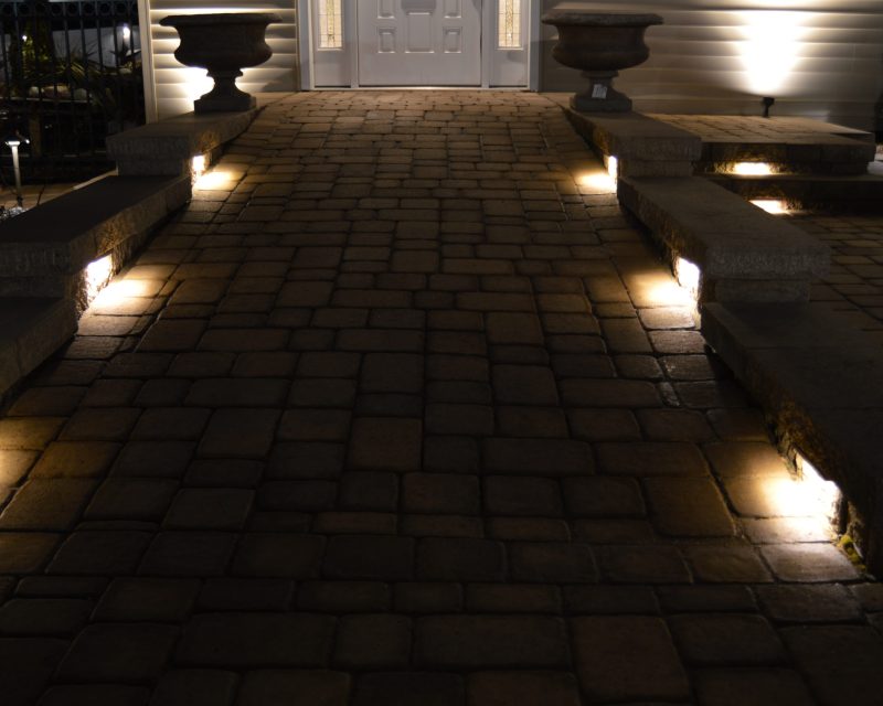 Closeup of lighted entrance way to house