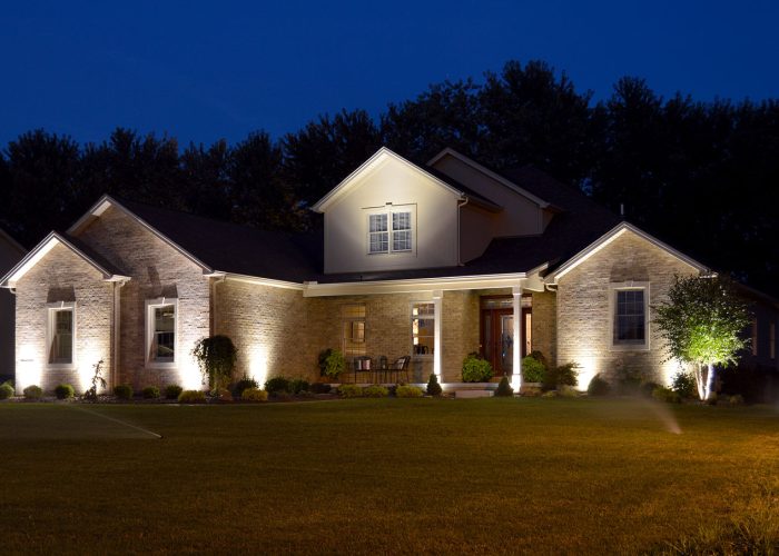 Illuminated house with spot and hardscape lighting